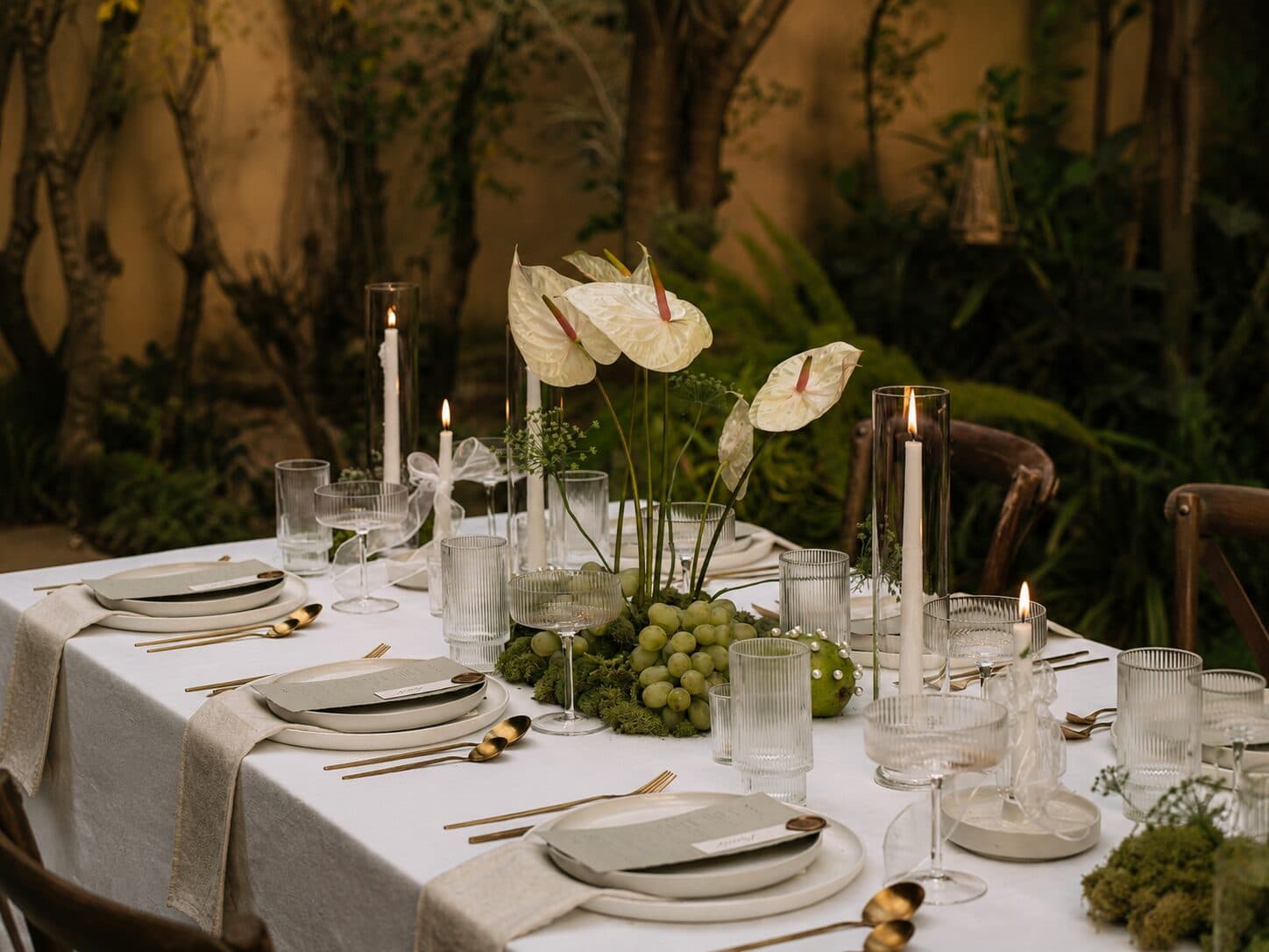A chef plating a course at a private NOR Table dinner.